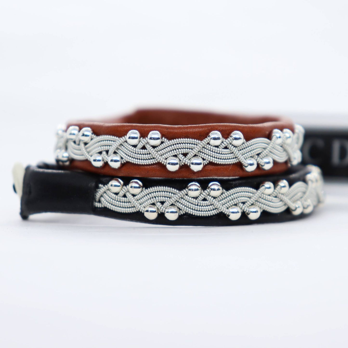 Handmade Sami bracelets in leather with sterling silver beads.