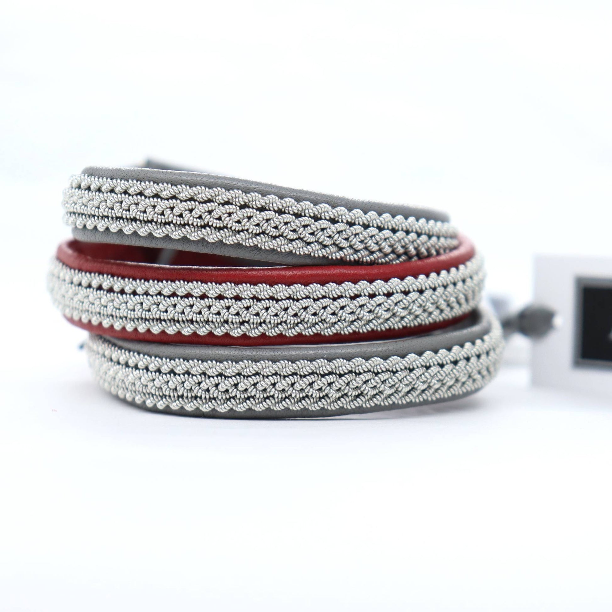 Ask is sami bracelets in reindeer leather and pewter wire braids.