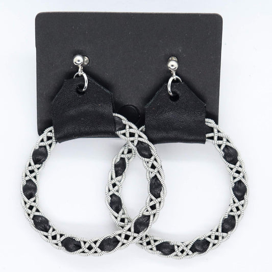 Sami earrings in Black reindeer leather and pewter braids.