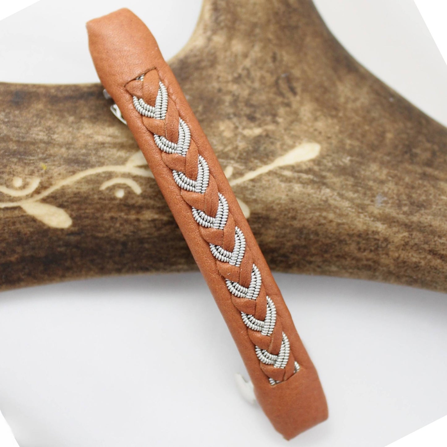 Handcrafted sami hair clip with pewter wire and decorative leather thread
