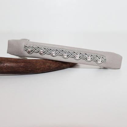 Scandinavian hair barrette featuring a pewter braid and sterling silver bead accents