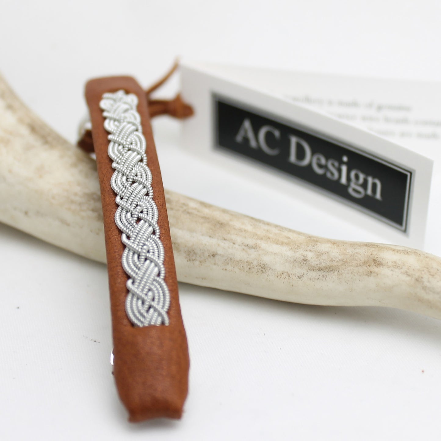 Sami hair barrette in reindeer leather with decorative pewter braid