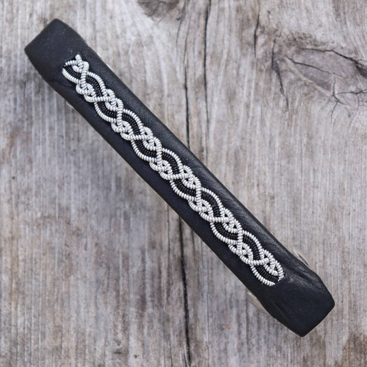 Handcrafted hair clip with pewter braid and decorative black copper wire.