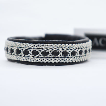 Sami bracelet in reindeer leather and pewter thread