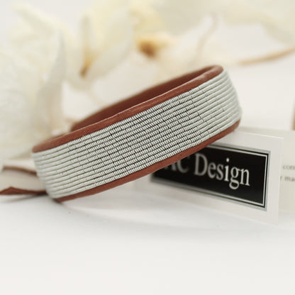 Sami bracelet in nature brown leather and pewter thread handmade in Sweden