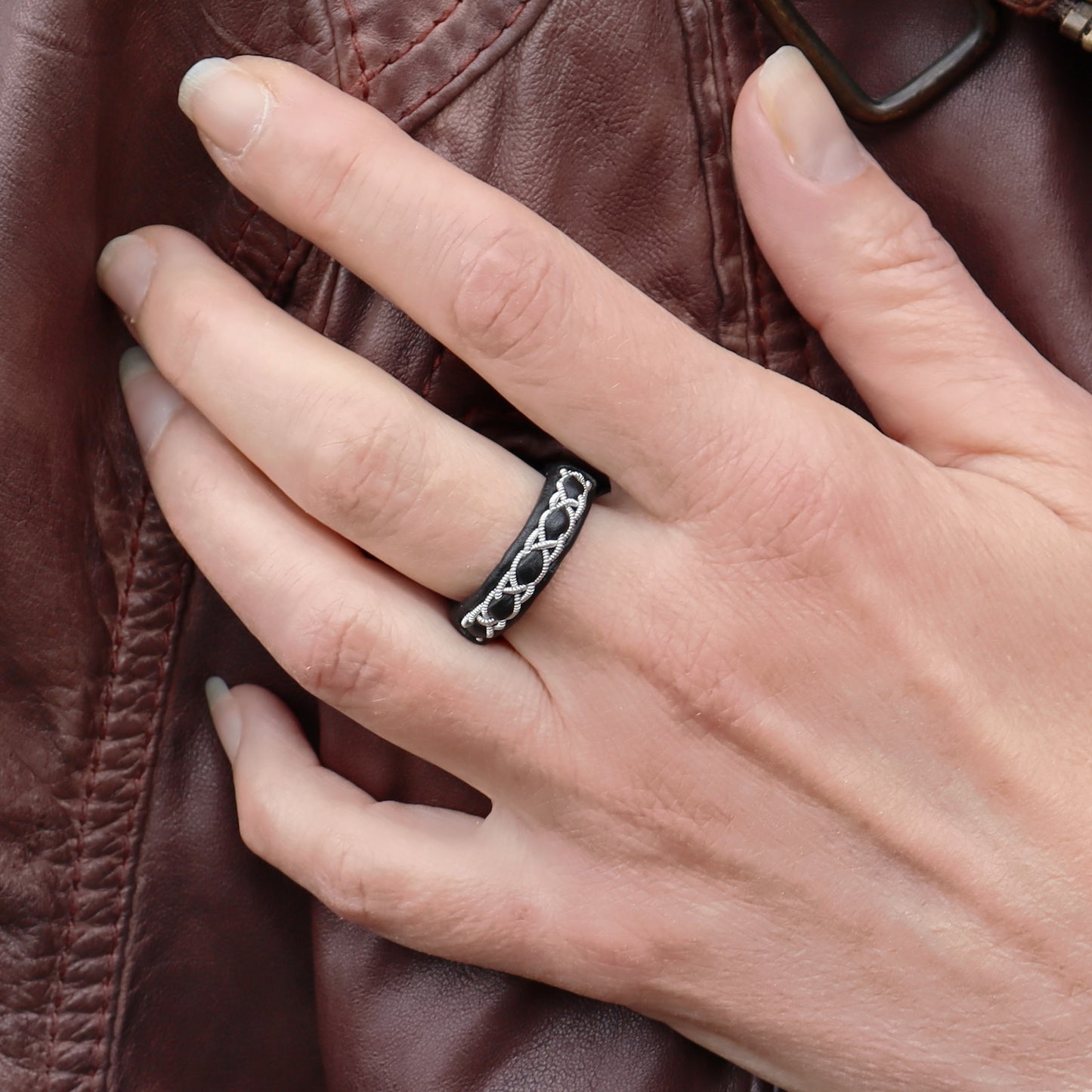 Narrow Sami ring, worn on finger