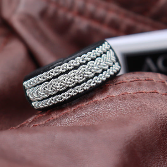 Handmade Sami ring in reindeer leather and pewter wire