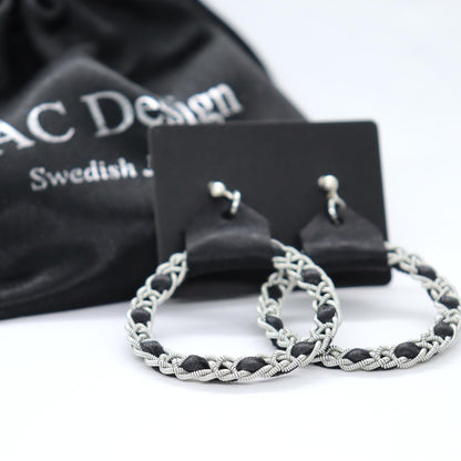 Handmade Sami earrings in Black reindeer leather and pewter braids.