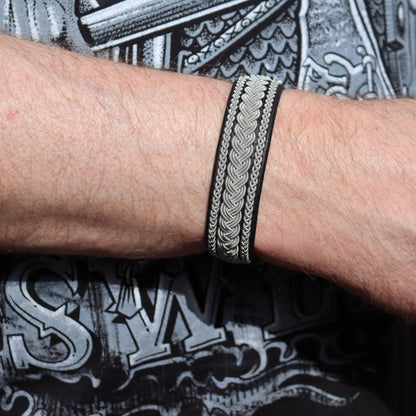 Close-up of Sami leather bracelet with pewter braids worn on wrist