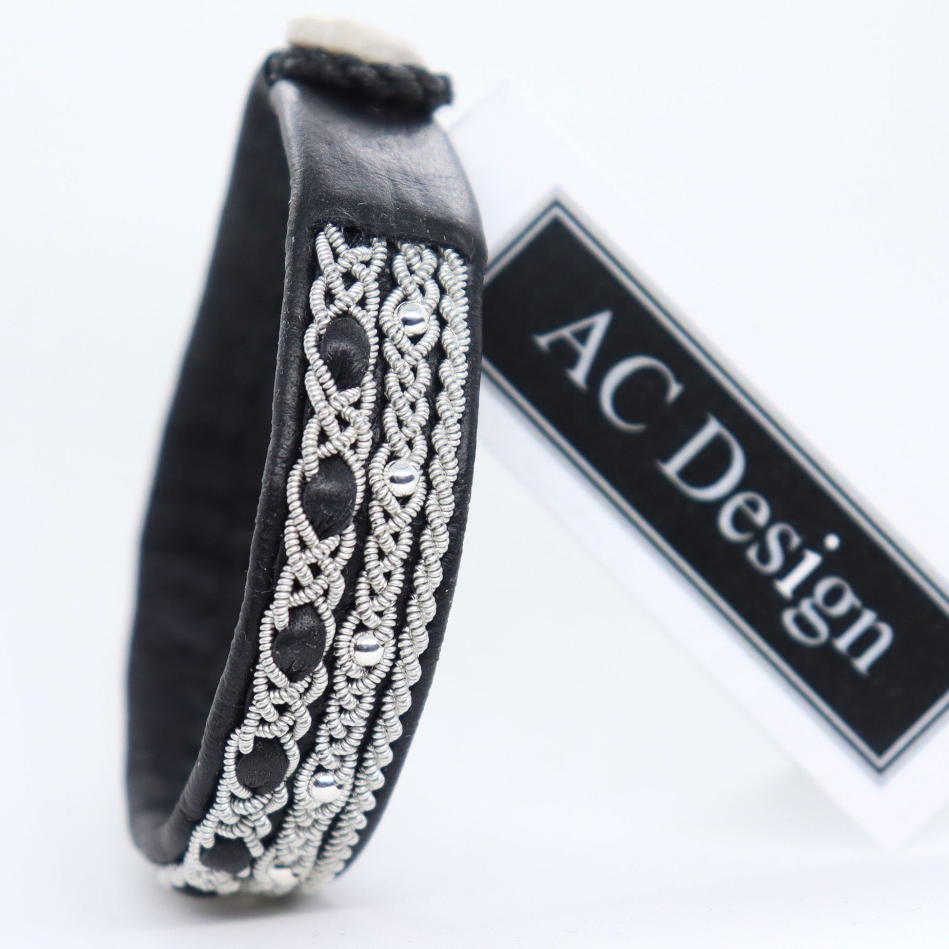 Standing Sami bracelet in reindeer leather, pewter braids and silver beads