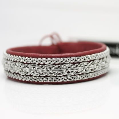 handmade sami bracelet in pewter thread and red reindeer leather