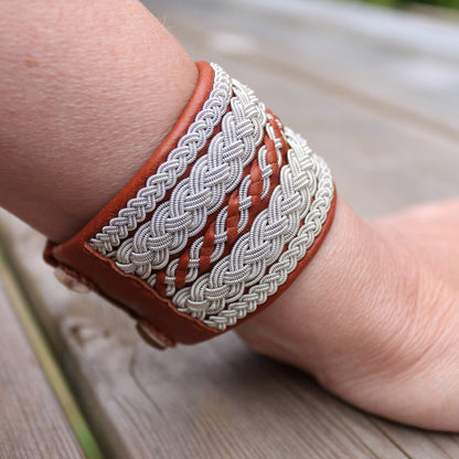 Wide Sami bracelet worn on wrist